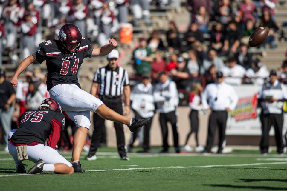 NMSU kicker Ethan Albertson kicks the ball during a NMSU football game on Saturday, Nov. 12, 2022, at the Aggie Memorial Stadium.  