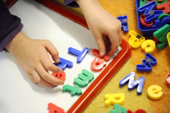 File photo dated 08/02/12 of a child playing. Families are paying more on average for part-time childcare than they spend on their mortgage, according to a new report. PRESS ASSOCIATION Photo. Issue date: Tuesday March 4, 2014. It reveals parents are handing over more than ?7,500 a year for childcare for two children, around 4.7% more than the average mortgage bill. The report, by the Family and Childcare Trust, also suggests that some families may be spending more on childcare than they do on their weekly shopping. See PA story EDUCATION Childcare. Photo credit should read: Dominic Lipinski/PA Wire