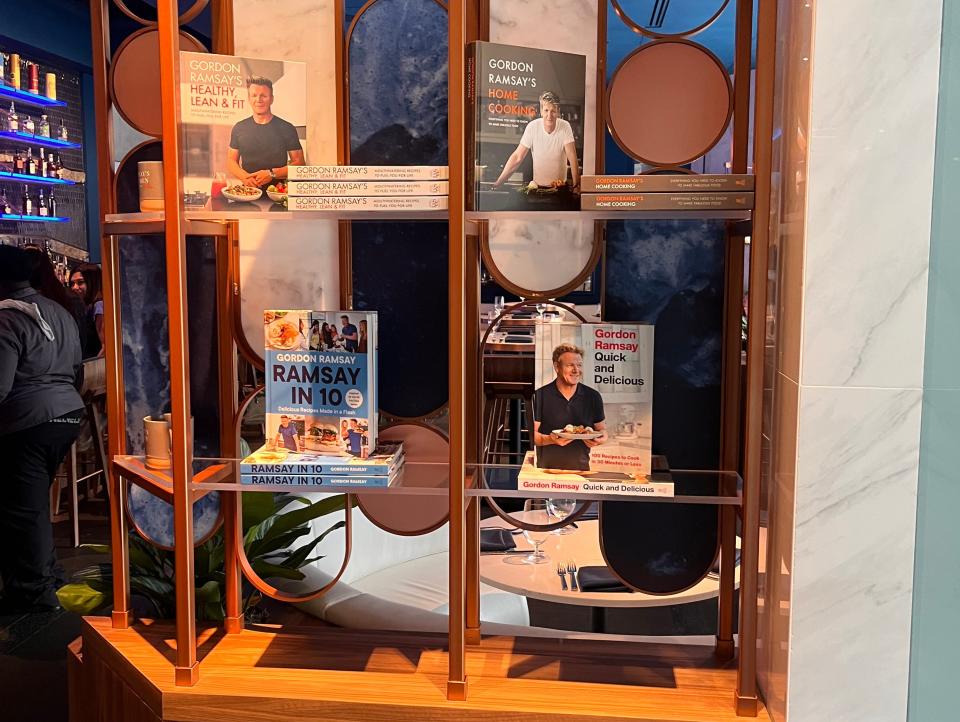 Shelf with cookbooks by Gordon Ramsay