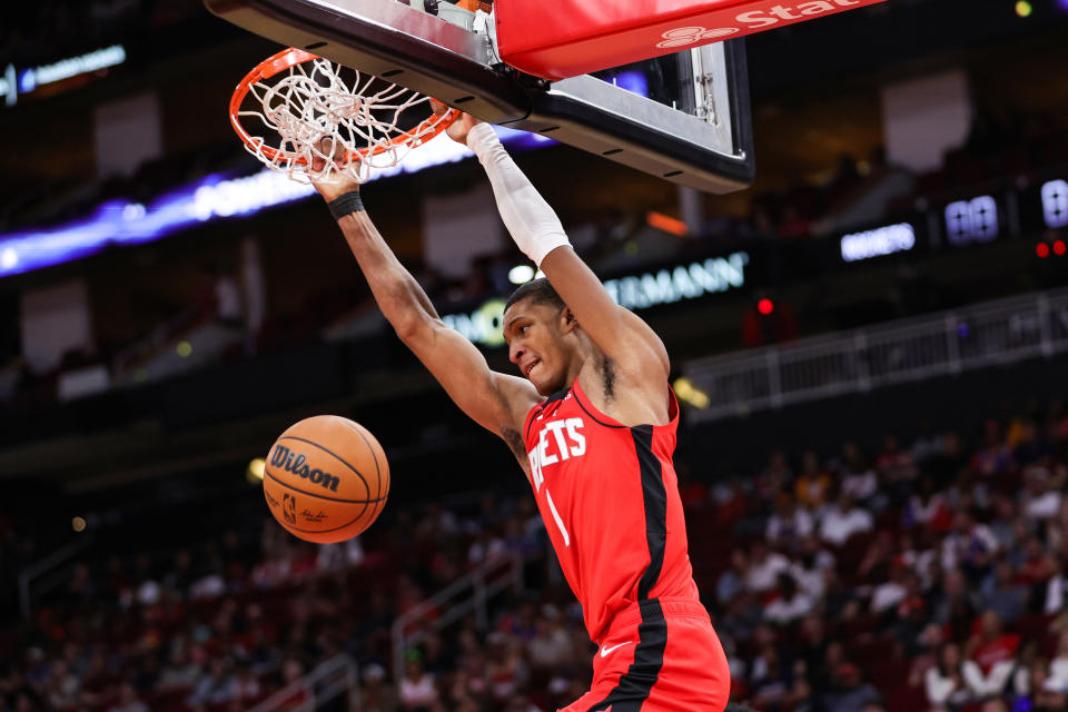 HOUSTON, TEXAS - OCTOBER 24: Jabari Smith Jr. #1 of the Houston Rockets dunks the ball during the second half against the Utah Jazz at Toyota Center on October 24, 2022 in Houston, Texas. NOTE TO USER: User expressly acknowledges and agrees that, by downloading and or using this photograph, User is consenting to the terms and conditions of the Getty Images License Agreement. (Photo by Carmen Mandato/Getty Images)