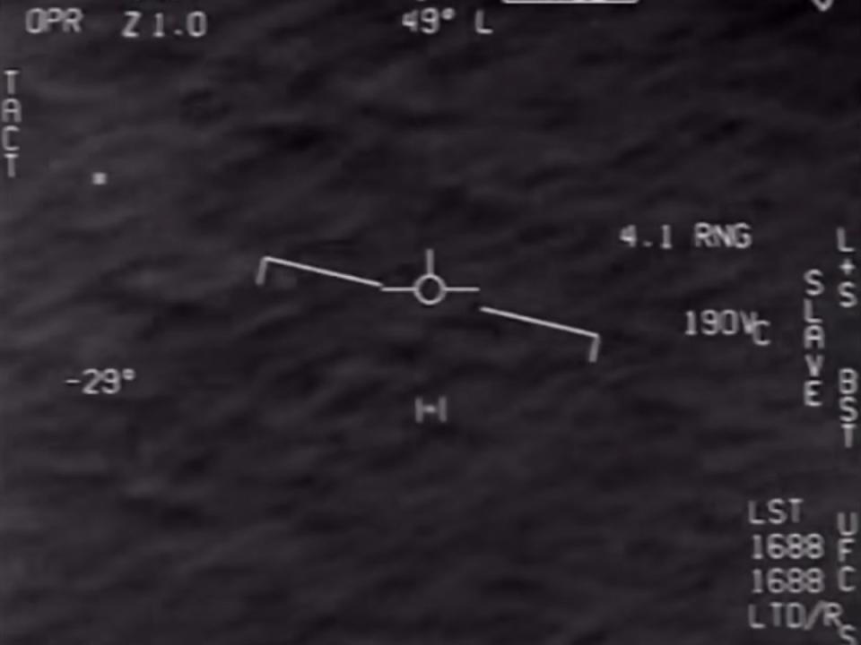 A still shot of the ‘Tic Tac’ unidentified aerial object recorded by US Navy pilots in 2004 (screengrab/PBS News Hour)