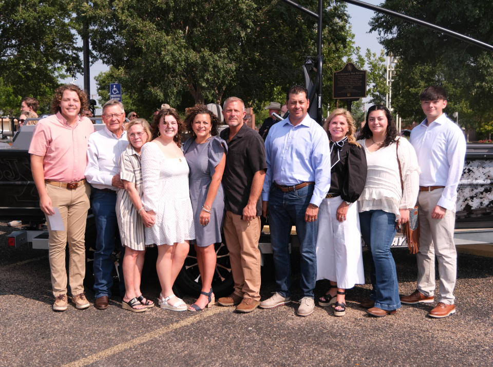 Family members of late Trooper Matthew Myrick stand by the vessel named for the fallen officer at the boat dedication ceremony Friday morning at the Texas Panhandle War Memorial Center in Amarillo.