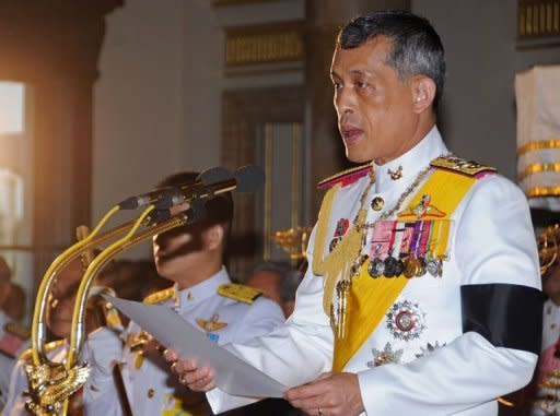 Thai Crown Prince Maha Vajiralongkorn reads a statement during the opening ceremony of the new parliament at Ananta Samakhom Throne Hall in Bangkok. Thailand's new parliament officially opened on Monday, faced with the daunting challenge of bringing stability to the kingdom after five years of political turmoil