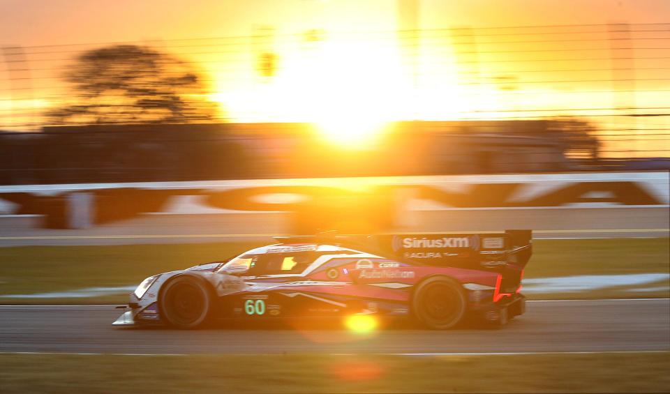 The no. 60 Acura ARX-06 runs through the chicane as the sun starts to brighten the sky , Sunday morning January 29, 2023 during the Rolex 24 at Daytona International Speedway.