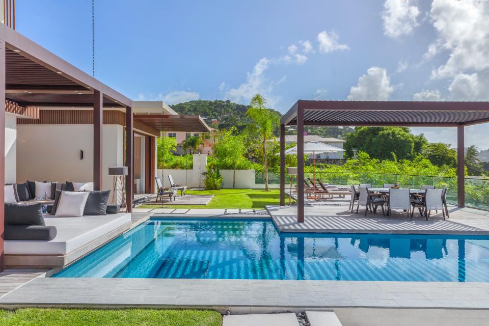 The lush patios at one of the new Silversands Grenada villas.