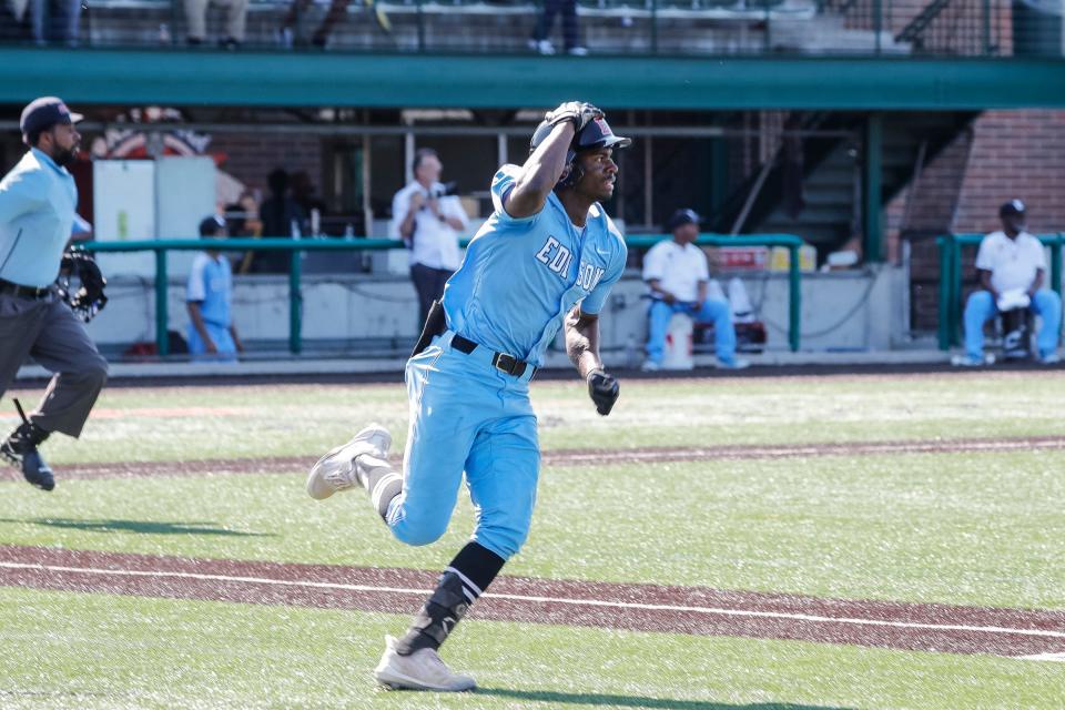 Detroit Edison center fielder Gregory Pace bats a triple against Orchard Lake St. Mary's during the first inning at the Corner Ballpark in Detroit on Friday, May 13, 2022.