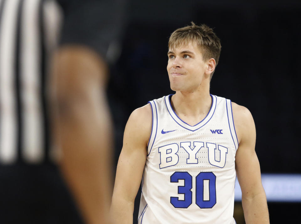 BYU guard Dallin Hall (30) reacts after a play during the first half of an NCAA college basketball game against Creighton, Saturday, Dec. 10, 2022, in Las Vegas. (AP Photo/Ronda Churchill)