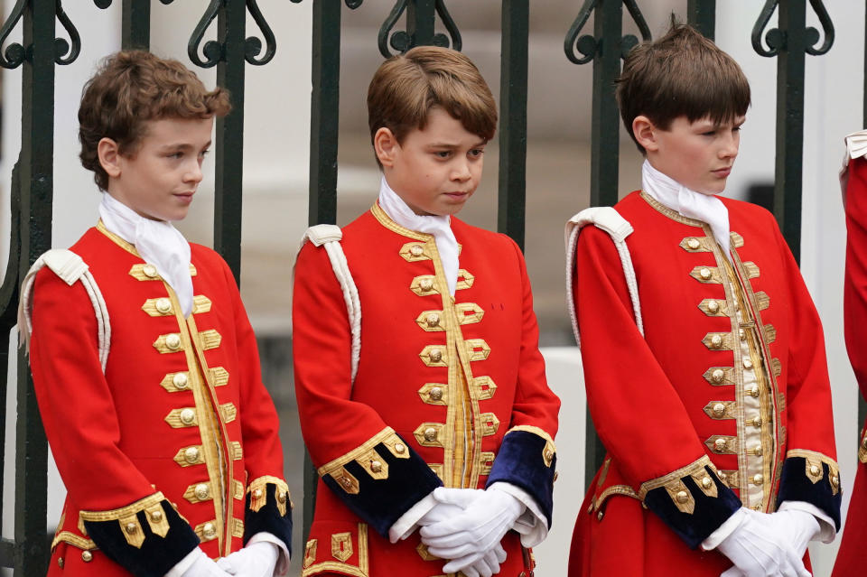 Prince George (middle) as one of four Pages of Honour ahead of the coronation ceremony.<span class="copyright">Jacob King—PA Wire/AP</span>