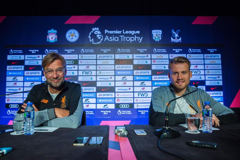 Jurgen Klopp and Simon Mignolet at a press conference earlier in December