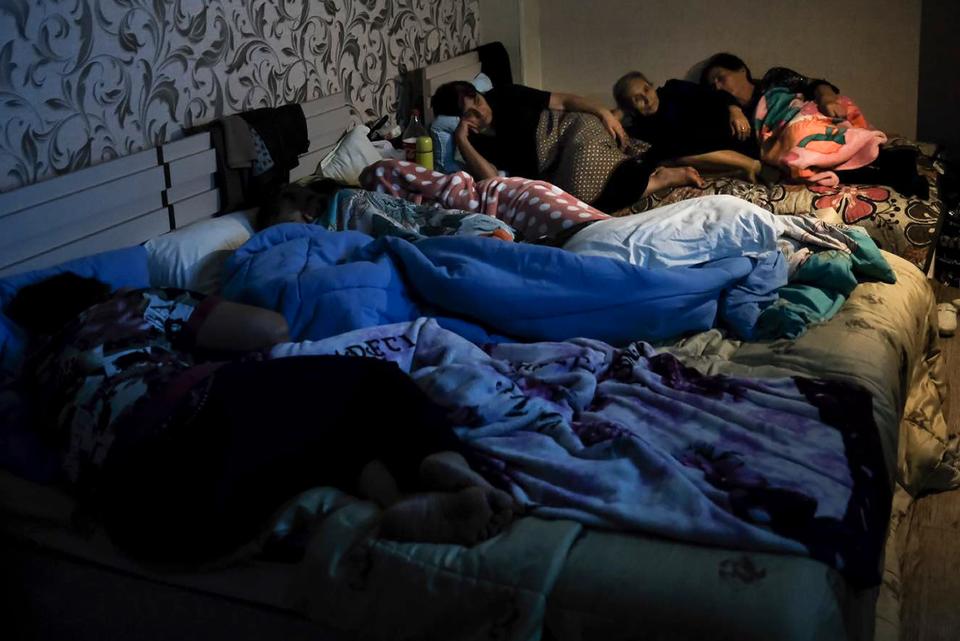 People watching TV in bomb shelter during Nagorno-Karabakh conflict