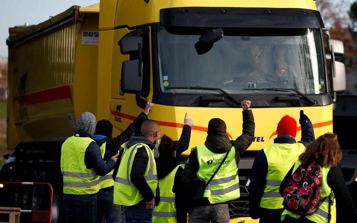 'Yellow vest' protests against fuel price hikes in Nantes - REUTERS