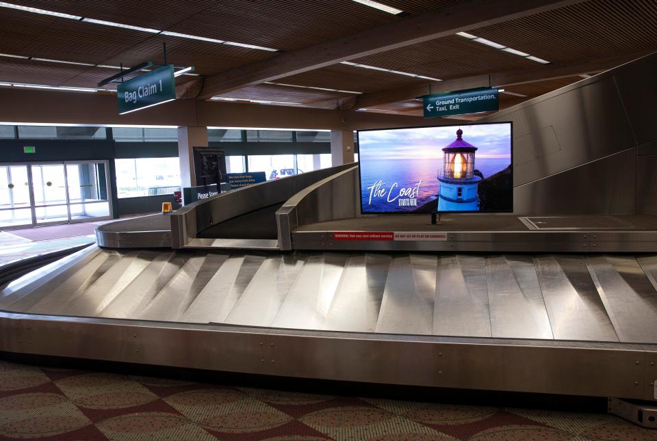 A consulting firm has recommended the Eugene Airport add two more luggage claim carousels.