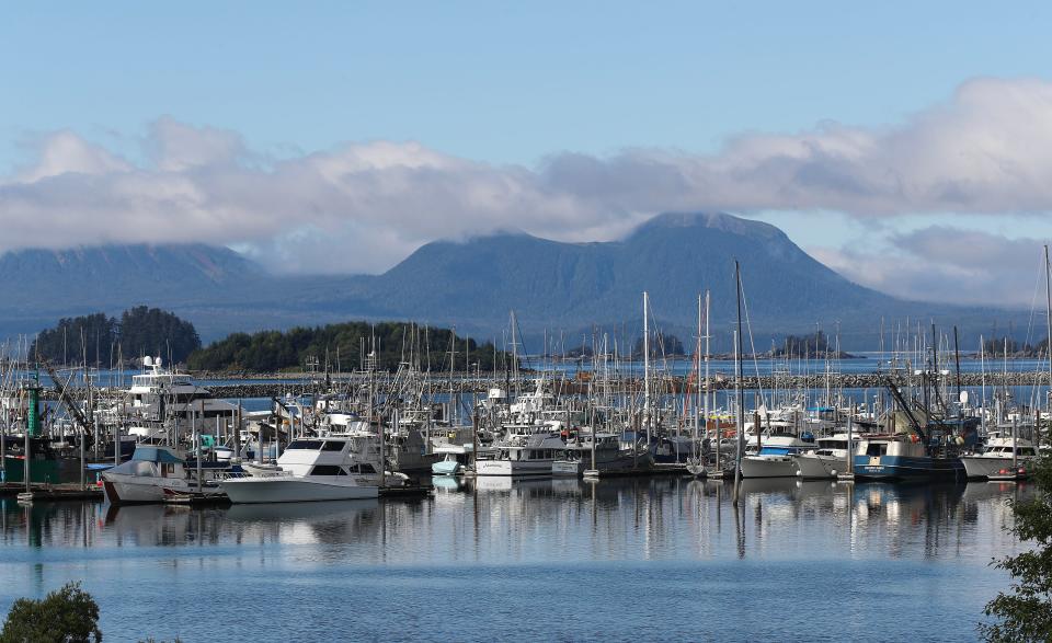 A low cloud hangs over a harbor in Sitka, Alaska, on Aug. 26, 2023.