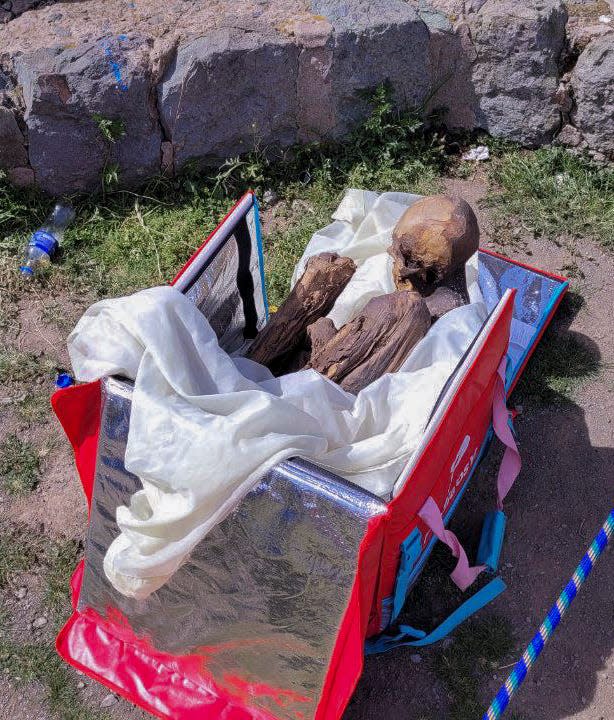 This handout picture released on February 25, 2023 by Puno TV shows a mummy found inside a cooler box used by a delivery service worker in Puno, Peru.