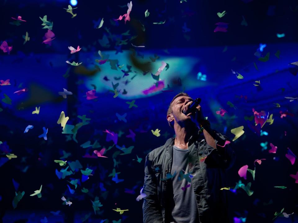 Chris Martin of Coldplay performs live on the pyramid stage during the Glastonbury Festival in 2011 (Getty)