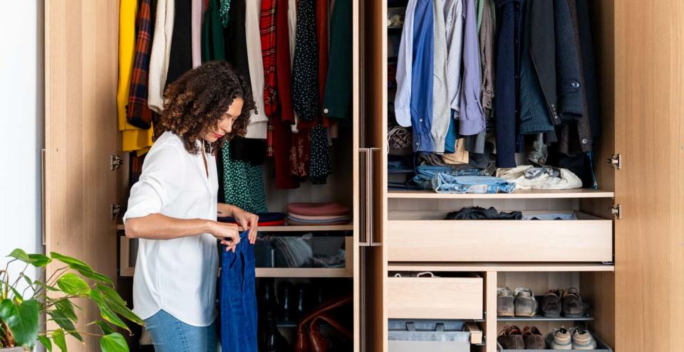 Letting go of stuff, even if you no longer need or use it, can be hard. Here&#39;s how to make it easier, according to experts. (Photo: Getty Images)