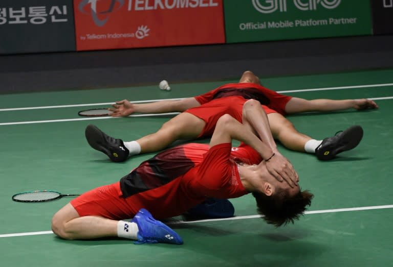 Indonesia's Marcus Fernaldi Gideon (behind) and Kevin Sanjaya Sukamuljo won the men's doubles