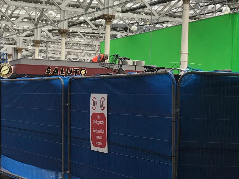 shot of a film production set in the middle of a train station in Edinburgh Scotland