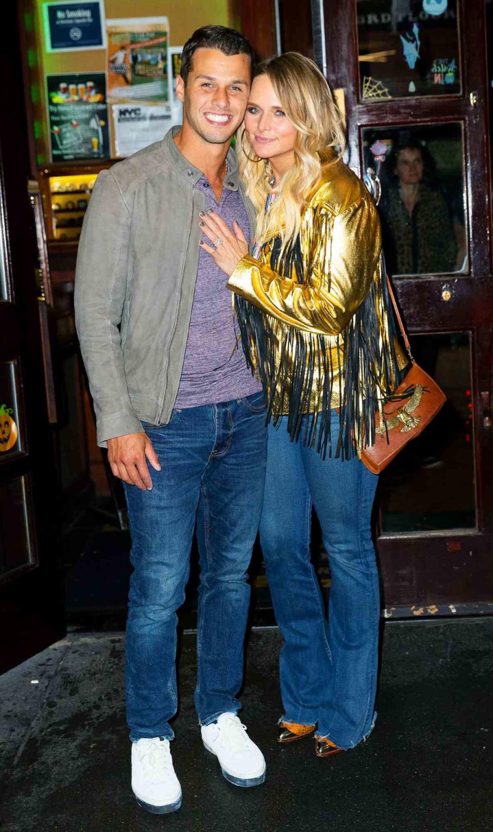 Brendan McLoughlin and Miranda Lambert pose for photos outside a pub on October 30, 2019 in New York City