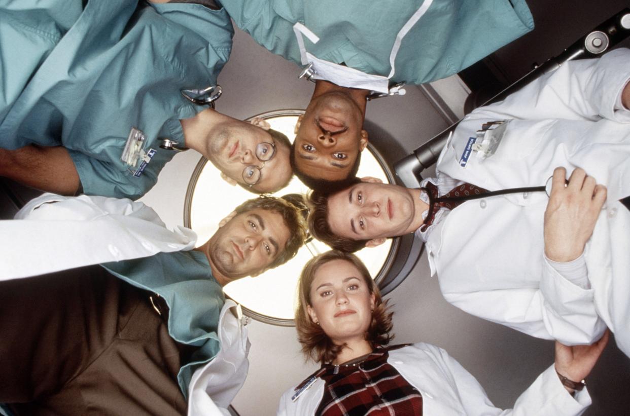 From left to right: Anthony Edwards, Eriq La Salle, Noah Wyle, Sherry Stringfield and George Clooney on Season 1 of ER. (NBC/Courtesy Everett Collection)