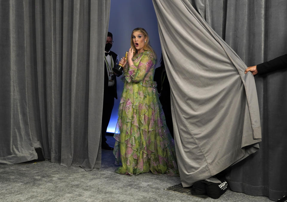 Emerald Fennell, winner of the award for best original screenplay for "Promising Young Woman," poses in the press room at the Oscars on Sunday, April 25, 2021, at Union Station in Los Angeles. (AP Photo/Chris Pizzello, Pool)