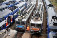 Transilien trains, the suburban railway service of French state-owned railway company SNCF, are parked at a SNCF depot station in Charenton-le-Pont near Paris, France, May 31, 2016 as railway workers will start a national railway strike on Tuesday evening. REUTERS/Charles Platiau