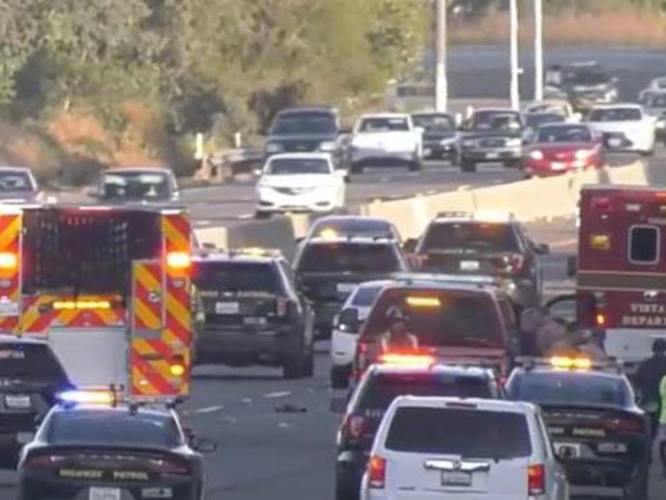 First responders are pictured at the scene where the children were killed (ABC7)