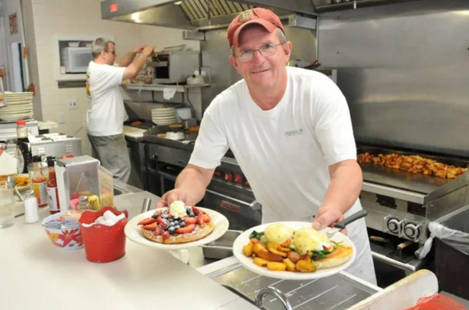 Rocky Botelho serves up food at Franklin Spa in 2012.