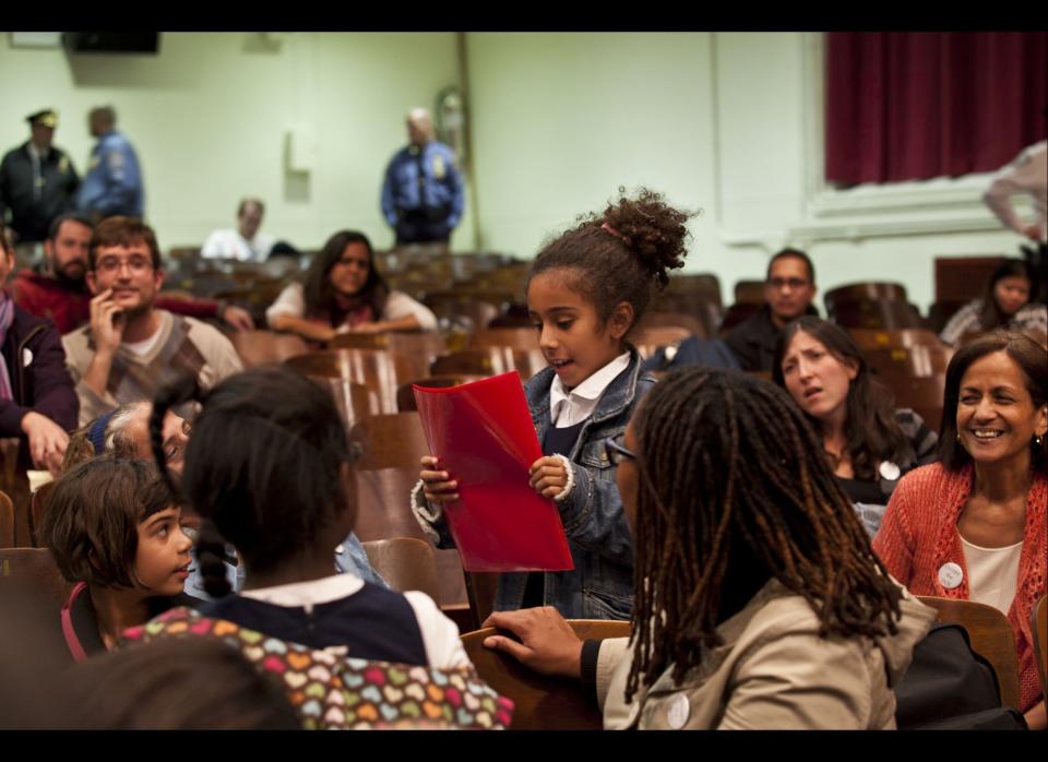 A little girl voices her demands for smaller class sizes in her school in support of Occupy Wall Street which showed up at the Mayor's Panel for Educational Policy meeting with Chancellor Walcott at Seward Park High School, New York on Tuesday, October 26, 2011. (Myra Iqbal, AOL)