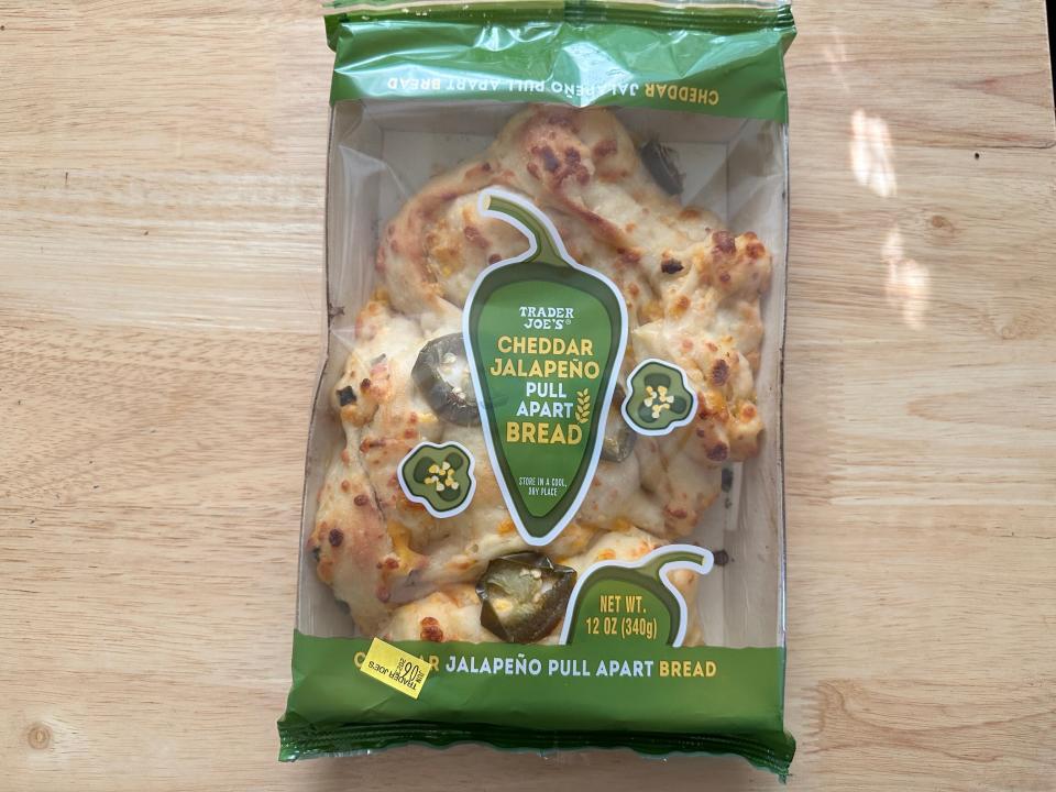 Trader Joe's cheddar-jalapeño pull-apart bread in plastic package with pepper on the front