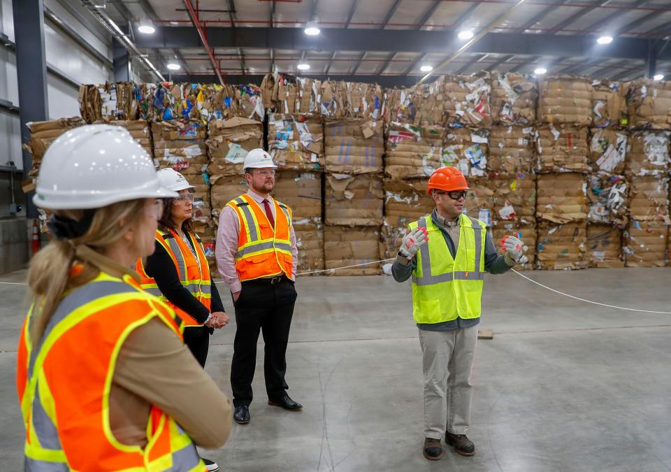 ND Paper Biron Division vice president and general manager Caleb Coder leads a tour of the new recycling facility on Thursday, May 18, 2023, at the ND Paper mill in Biron, Wis.