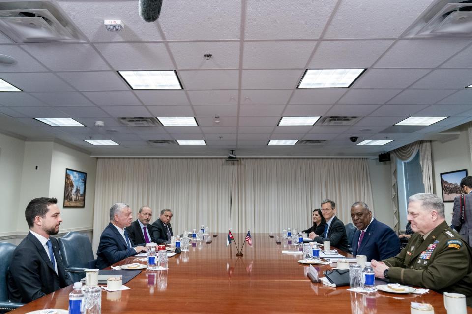 Secretary of Defense Lloyd Austin, second from right, accompanied by Chairman of the Joint Chiefs of Staff Gen. Mark Milley, right, speaks during a meeting with Jordan's King Abdullah II bin Al-Hussein, second from left, and Crown Prince of Jordan Hussein bin Abdullah, left, at the Pentagon in Washington, Thursday, May 12, 2022. (AP Photo/Andrew Harnik)