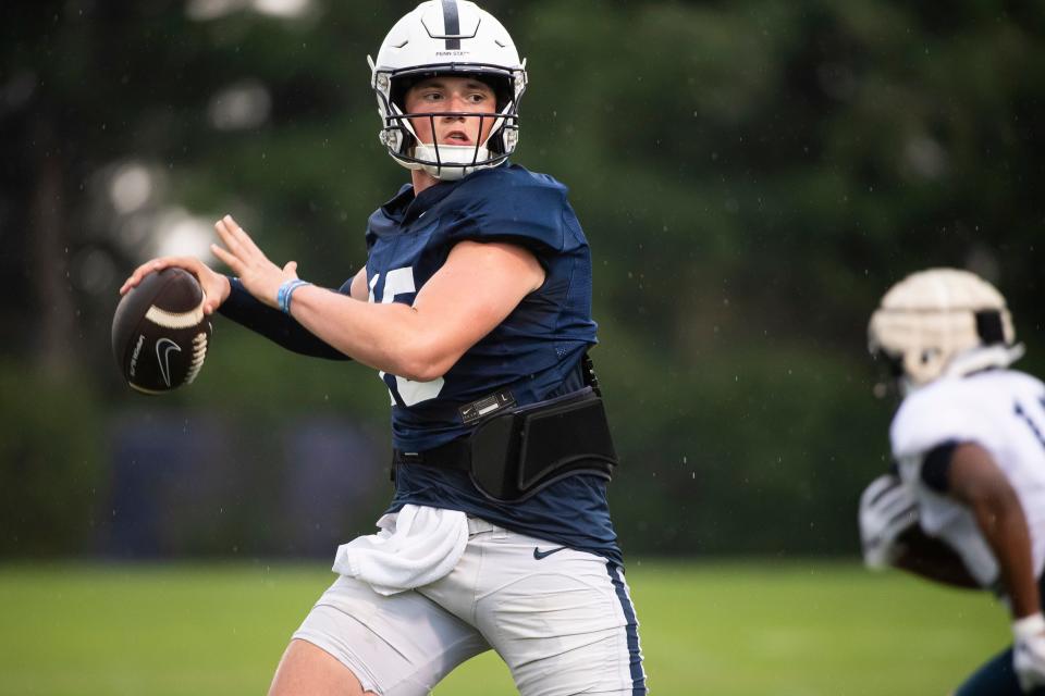 Penn State sophomore quarterback Drew Allar prepares to throw the ball during a practice session at the Lasch outdoor fields on Sunday, August 6, 2023, in State College.