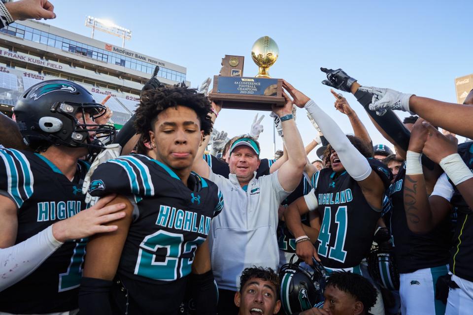 Dec 10, 2022; Tempe, AZ, USA; The Highland Hawks celebrate with their state champions trophy after defeating the Pinnacle Pioneers 37-26 during the 6A state championship game at Sun Devil Stadium in Tempe on Saturday, Sept. 10, 2022. Mandatory Credit: Alex Gould/The Republic