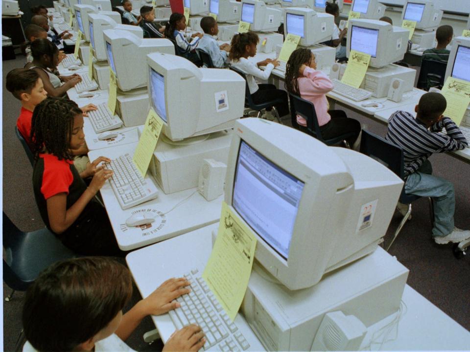 Students practice their keyboarding skills at Richardson Independent School District's Forest Lane Academy in Dallas, Texas, in 1999