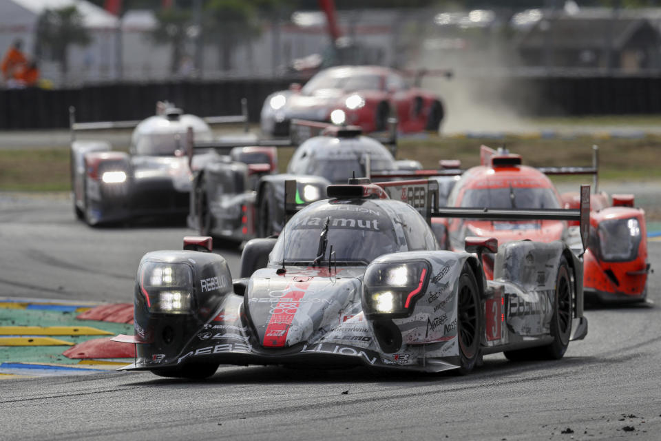 The Rebellion R13 No3 of the Rebellion Racing Team driven by Nathanael Berthon of France, Romain Dumas of France and Louis Deletraz of Switzerland in action during the 88th 24-hour Le Mans endurance race, in Le Mans, western France, Sunday, Sept. 20, 2020. Due to coronavirus crisis, the race takes place without spectators. (AP Photo/David Vincent)