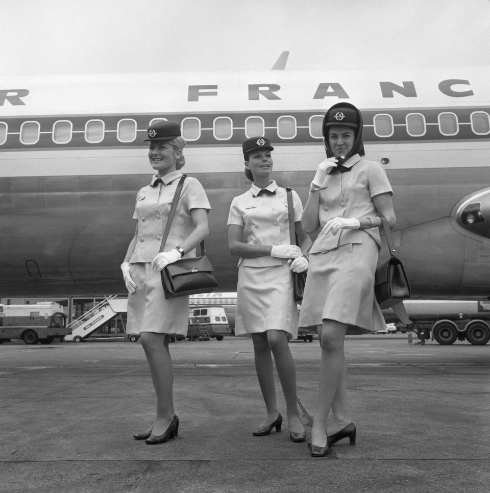 Three Air France air hostesses at London&rsquo;s Heathrow Airport wearing new uniforms designed by Balenciaga in 1969.