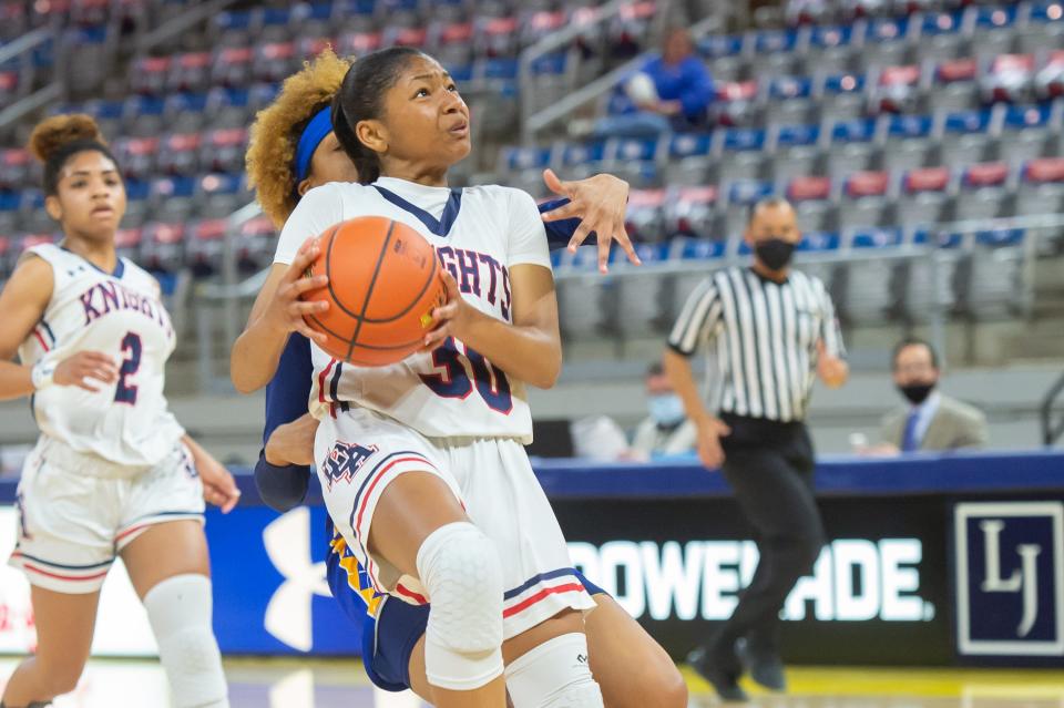 Jada Richard takes a shot as LCA takes on St Charles in the Semi Finals of the LHSAA Girls State Championship Tournament. Wednesday, March 3, 2021.