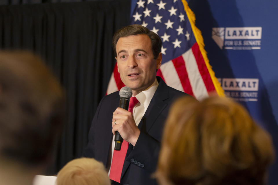 Nevada Republican U.S. Senate candidate Adam Laxalt celebrates his victory with family, friends and supporters at the Tamarack Casino in Reno, Nev., Tuesday, June 14, 2022. (AP Photo/Tom R. Smedes)