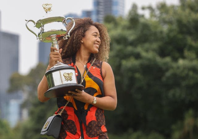 Naomi Osaka poses with the Daphne Akhurst Memorial Cup