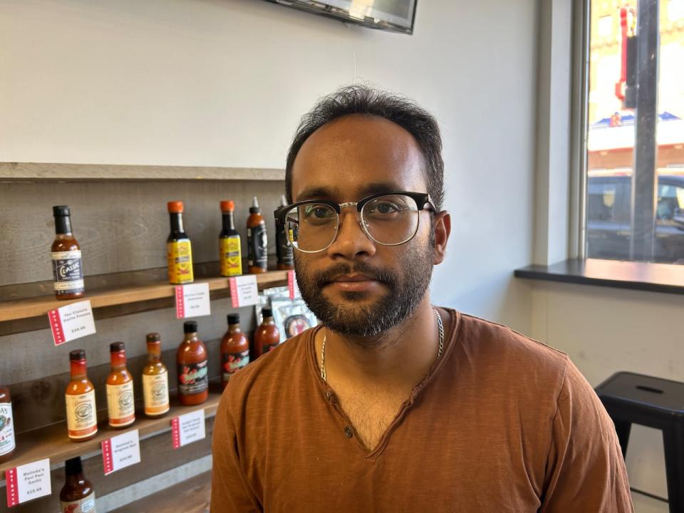 Sanjeev Kumar, who works as a line cook in Saskatoon, says he has no savings and often finds himself unable to buy groceries.