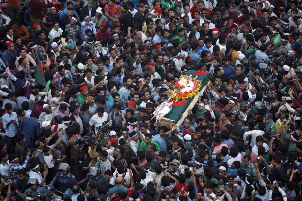 <span class="caption">In this 2013 photo, Bangladeshi mourners carry the coffin containing the body of blogger Ahmed Rajib Haider for funeral.</span> <span class="attribution"><a class="link " href="http://www.apimages.com/metadata/Index/Bangladesh-Bloggers-Murder/6f51046dcd5b4f948ed5303b5acf79b6/17/0" rel="nofollow noopener" target="_blank" data-ylk="slk:AP Photo/Pavel Rahman, File;elm:context_link;itc:0;sec:content-canvas">AP Photo/Pavel Rahman, File</a></span>