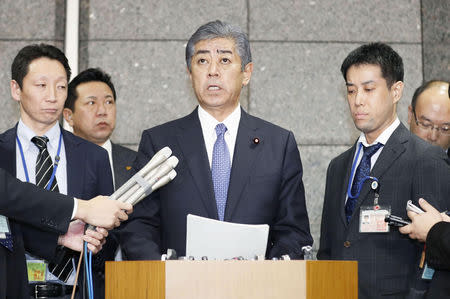 Japanese Defence Minister Takeshi Iwaya speaks during a news conference at Defence Ministry in Tokyo, Japan, in this photo taken by Kyodo December 21, 2018. Mandatory credit Kyodo/via REUTERS ATTENTION EDITORS - THIS IMAGE WAS PROVIDED BY A THIRD PARTY. MANDATORY CREDIT. JAPAN OUT. NO COMMERCIAL OR EDITORIAL SALES IN JAPAN.