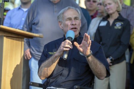 FILE PHOTO: May 18, 2018; Santa Fe, TX, USA; Texas governor Greg Abbott speaks at a vigil for the victims of the Santa Fe high school shooting in Santa Fe, Texas following a shooting that killed 10 at Santa Fe High School. John Glaser-USA TODAY NETWORK