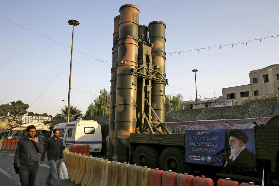 FILE - A Russian-made S-300 air defense system sits on display for the annual Defense Week, marking the 37th anniversary of the 1980s Iran-Iraq war, at Baharestan Square in Tehran, Iran, Sept. 24, 2017. Satellite photos taken Monday suggest an apparent Israeli retaliatory strike targeting Iran's central city of Isfahan hit a radar system for a Russian-made air defense battery, contradicting repeated denials by officials in Tehran in the time since the assault. (AP Photo/Vahid Salemi, File)