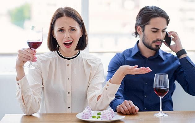 Don't you hate it when people answer their phones at the dinner table? Photo: Getty Images