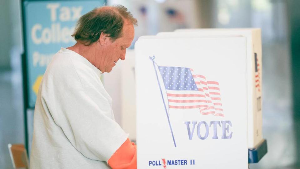 Tracy Nelson fills out his ballot at a voting station in the lobby in front of the elections office. Ballots were being collected at the San Luis Obispo Clerk-Recorder’s office at the Katcho Achadjian Government Center during the Super Tuesday election March 5, 2024. David Middlecamp/dmiddlecamp@thetribunenews.com