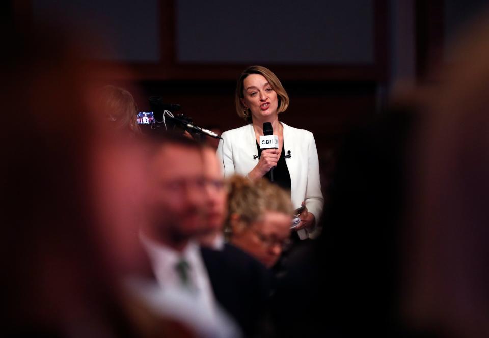 BBC Political Editor Laura Kuenssberg asks a question to Britain's Prime Minister Theresa May during the annual Confederation of British Industry (CBI) conference in central London, on November 19, 2018. - British Prime Minister Theresa May on Monday defended her draft Brexit deal to business leaders ahead of 