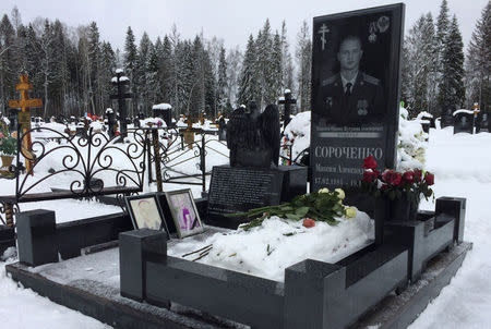 The grave of Russian special forces officer Maxim Sorochenko killed in Syria in November 2015, is seen at a cemetery outside Moscow, Russia, December 27, 2016. REUTERS/Maria Tsvetkova