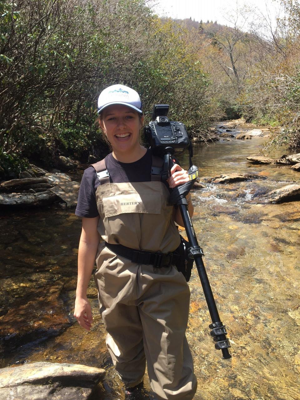 Citizen Times photojournalist Angie Wilhelm on assignment in 2019 on the Yellowstone Prong in Pisgah National Forest.